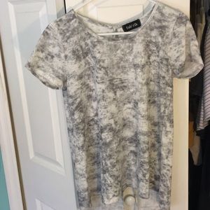 A marbled grey and white t-shirt